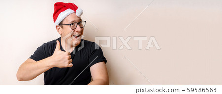 Happy Christmas Santa Claus showing thumb up. Isolated on white background. Lifestyle. Copy space 59586563