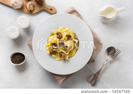 Spaghetti reginelle pasta with mushrooms. Spaghetti reginelle pasta with mushrooms. 59587588