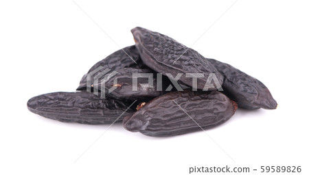 Tonka beans isolated on white background. Bean of Dipteryx odorata, cumaru or kumaru. Fresh aroma 59589826
