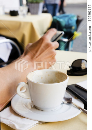 man having a cappuccino outdoors man having a cappuccino outdoors 59590155
