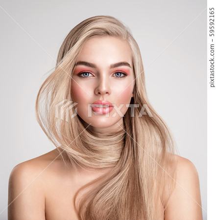 Portrait of a blonde beautiful woman with a long Portrait of a blonde beautiful woman with a long 59592165