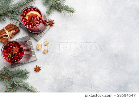 Cranberry juice with lemon and cane sugar. Winter hot drink. Copy space 59594547