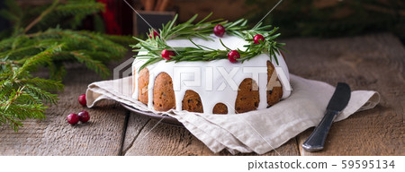 Traditional homemade Christmas fruit cake on the Traditional homemade Christmas fruit cake on the 59595134
