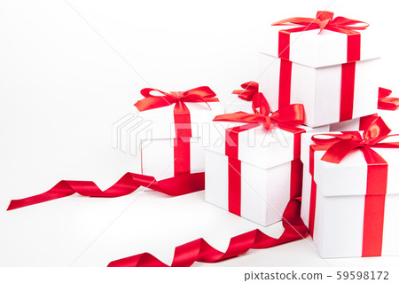 White boxes with a red satin ribbon bow Isolated on white background, Isolated 59598172