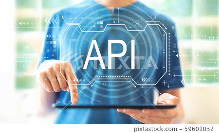 API concept with man using a tablet API concept with man using a tablet 59601032