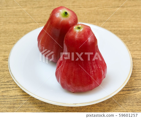 Two Red Water Apples on White Plate Two Red Water Apples on White Plate 59601257