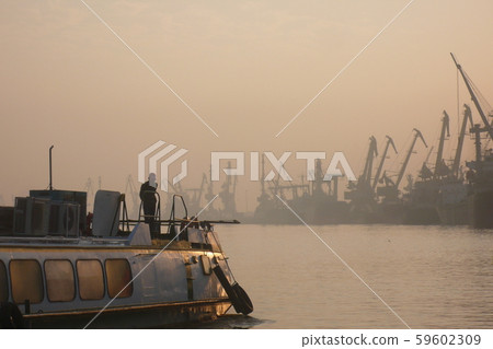 Sunrise in Haiphong Harbor, northern Vietnam Sunrise in Haiphong Harbor, northern Vietnam 59602309