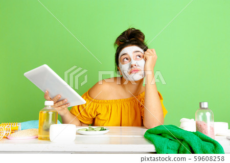 Portrait of young caucasian woman in her beauty day and skin care routine 59608258