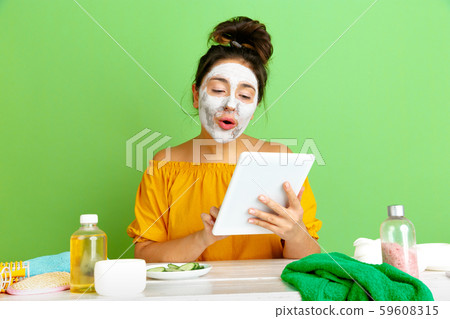 Portrait of young caucasian woman in her beauty day and skin care routine 59608315