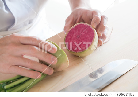 In front of the board to cut red radish In front of the board to cut red radish 59608493