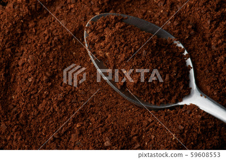 Milled fresh coffee in spoon Milled fresh coffee in spoon 59608553