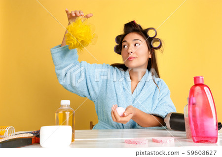 Portrait of young caucasian woman in her beauty day and skin care routine 59608627