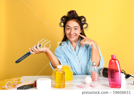 Portrait of young caucasian woman in her beauty day and skin care routine 59608631