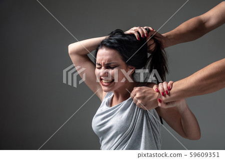 Woman being under domestic abuse and violence, concept of female rights Woman being under domestic abuse and violence, concept of female rights 59609351