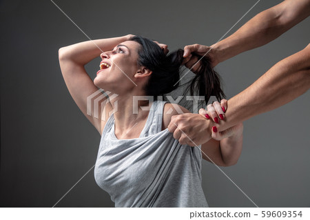 Woman being under domestic abuse and violence, concept of female rights Woman being under domestic abuse and violence, concept of female rights 59609354