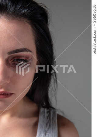Woman in fear of domestic abuse and violence, concept of female rights Woman in fear of domestic abuse and violence, concept of female rights 59609516