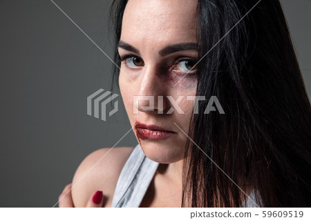 Woman in fear of domestic abuse and violence, concept of female rights Woman in fear of domestic abuse and violence, concept of female rights 59609519