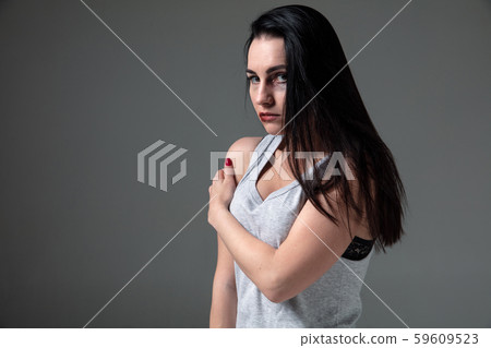 Woman in fear of domestic abuse and violence, concept of female rights Woman in fear of domestic abuse and violence, concept of female rights 59609523
