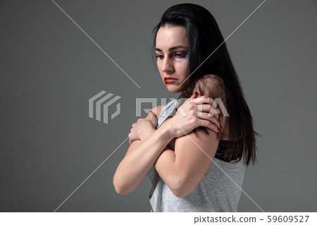 Woman in fear of domestic abuse and violence, concept of female rights Woman in fear of domestic abuse and violence, concept of female rights 59609527