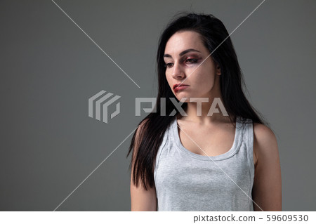 Woman in fear of domestic abuse and violence, concept of female rights Woman in fear of domestic abuse and violence, concept of female rights 59609530