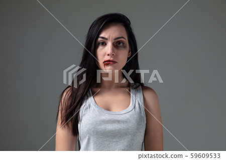 Woman in fear of domestic abuse and violence, concept of female rights Woman in fear of domestic abuse and violence, concept of female rights 59609533