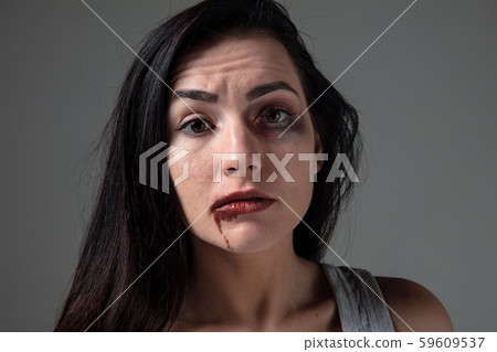 Woman in fear of domestic abuse and violence, concept of female rights Woman in fear of domestic abuse and violence, concept of female rights 59609537