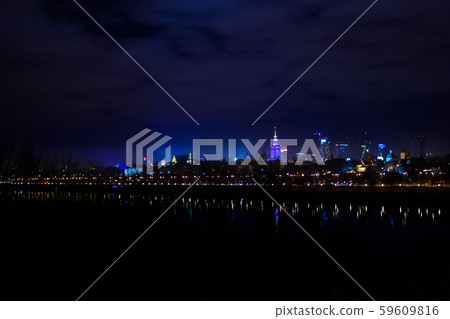 Warsaw in Poland by night, view with Vistula river and city center 59609816