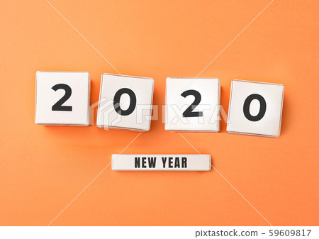 2020 made from white boxes with numbers on orange studio background 59609817