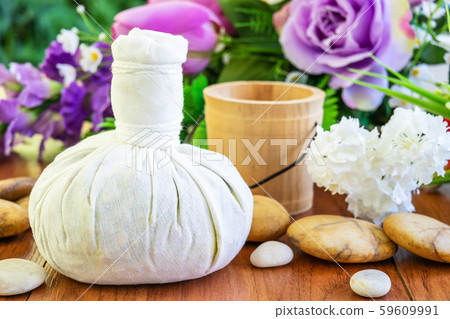 Thai Spa massage with herbal compress ball Thai Spa massage with herbal compress ball 59609991