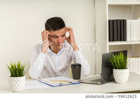 Serious frustrated asian businessman suffering Serious frustrated asian businessman suffering 59612623