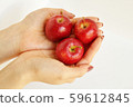 Three princess apples on both hands 59612845