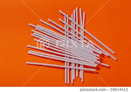 plastic drinking straws are scattered 59614413