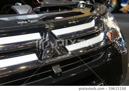 Mitsubishi commercial brand car, the emblem and logos at the car body. Mitsubishi is one of the famous car manufactures in the world from Japan.    59615198