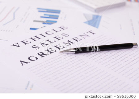 vehicle sales agreement concept, documents on the desktop 59616300