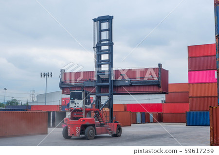 Container handlers In the harbor with storage Container handlers In the harbor with storage 59617239