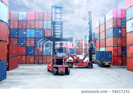 Forklift truck lifting cargo container in shipping Forklift truck lifting cargo container in shipping 59617242