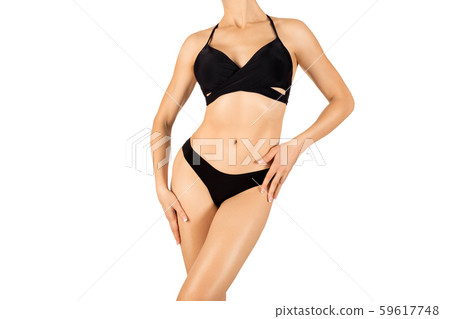 Woman fit cropped body in black bikini, isolated on white 59617748
