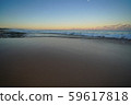 Sunrise at the sandy beach in Molokai Hawaii 59617818