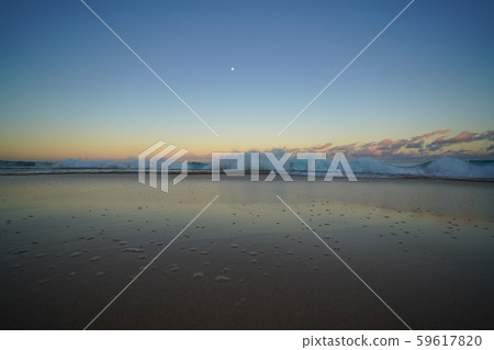 Sunrise at the sandy beach in Molokai Hawaii 59617820