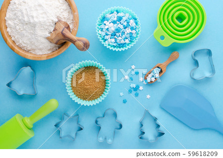 ingredients and kitchen tools for baking on blue background, flat lay ingredients and kitchen tools for baking on blue background, flat lay 59618209