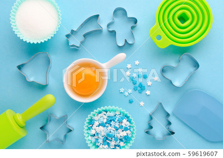 ingredients and kitchen tools for baking on blue background, flat lay ingredients and kitchen tools for baking on blue background, flat lay 59619607