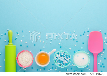 ingredients for baking and kitchen tools on blue background, flat lay ingredients for baking and kitchen tools on blue background, flat lay 59619670
