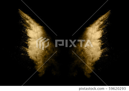 Golden powder explosion on black background. Freeze motion. Golden powder explosion on black background. Freeze motion. 59620293