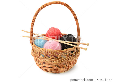 Wool balls in a basket isolated on a white Wool balls in a basket isolated on a white 59621278