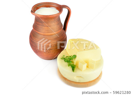 Clay jug milk and cheese isolated on white Clay jug milk and cheese isolated on white 59621280