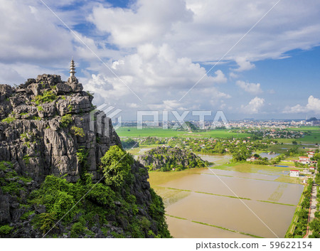Stunning view of karst formations and rice paddy fields from the lying dragon mountain, Tam Coc, Ninh Binh province, Vietnam 59622154