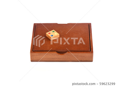 Chip from the puzzle mosaic on a closed box. 59623299