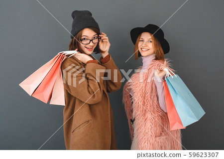 Young girls teenagers friends together shopping concept Young girls teenagers friends together shopping concept 59623307