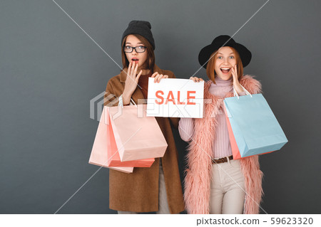 Young girls teenagers friends together shopping concept 59623320