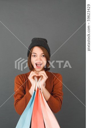 Young girl teenager isolated portrait shopping concept 59623429